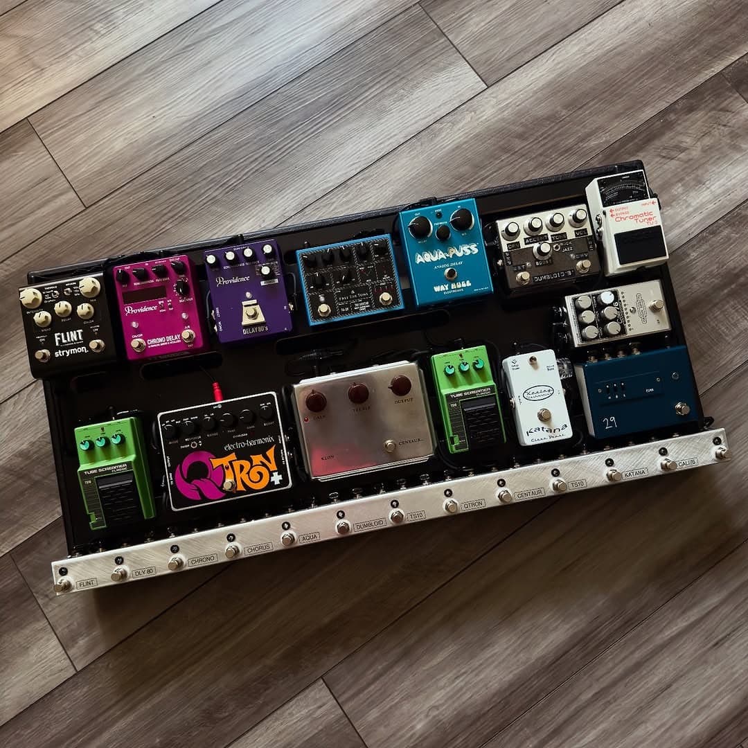 Overhead view of a custom pedalboard build by The Rig Doctor with Mogami cables